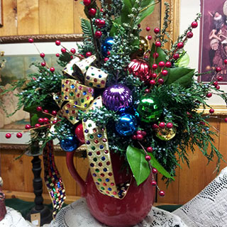 Christmas Decorations and customized real evergreen wreathes and arrangements from Howell's Floral.